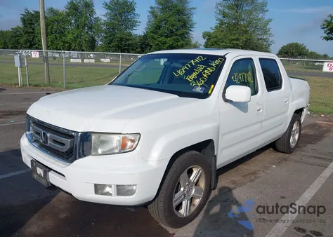 2011 Honda Ridgeline Rtl z USA, uszkodzony, nr VIN 5FPYK1F55BB453676